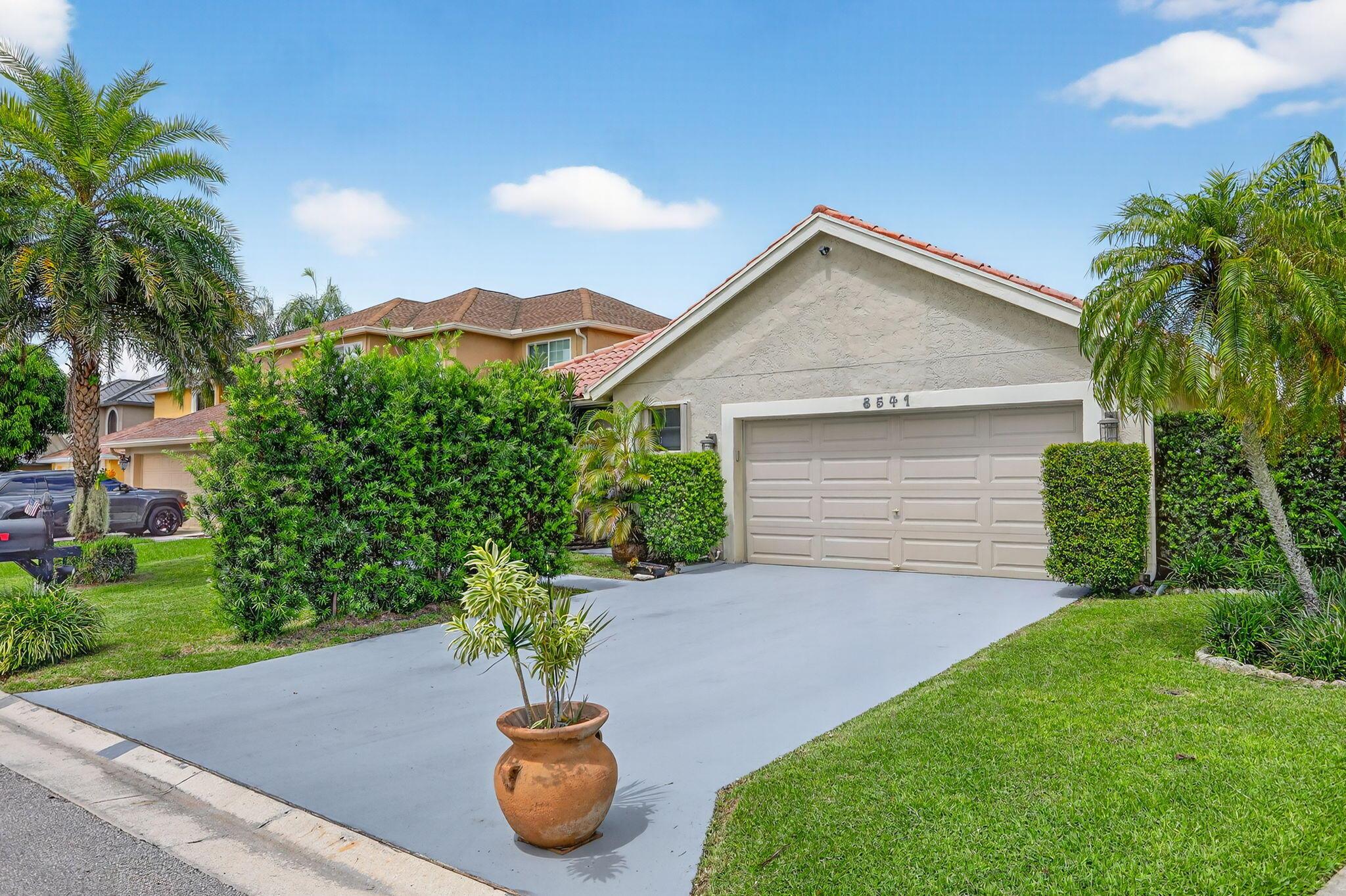Dream Home in Boca Raton!This stunning 3-bedroom, 2-bath home with a 2-car garage (epoxy flooring) offers gorgeous long lake views from the kitchen, living room, and lanai. Features include a tankless water heater, stainless steel appliances, granite countertops, updated bathrooms, hurricane-rated garage door, and accordion shutters throughout. Located in a peaceful, family-friendly neighborhood, just minutes from shopping, major highways, downtown Boca, and the beaches.Boca Raton is home to over 40 parks, miles of pristine beaches, a vibrant downtown, and A-rated public schools, along with some of the top private schools in the nation. Consistently ranked as one of the safest cities in Florida, Boca is ideal for families and professionals alike.📞 Don't wait.....