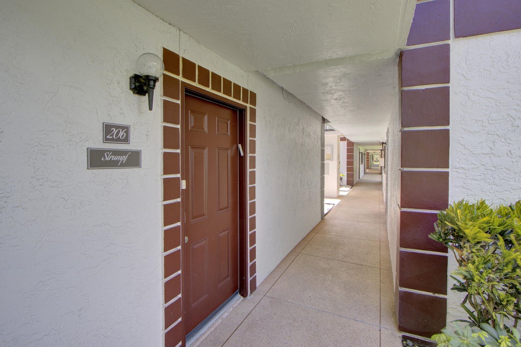 Photo of 15451 Pembridge Drive #206, Delray Beach, FL 33484 (MLS # B26045849)