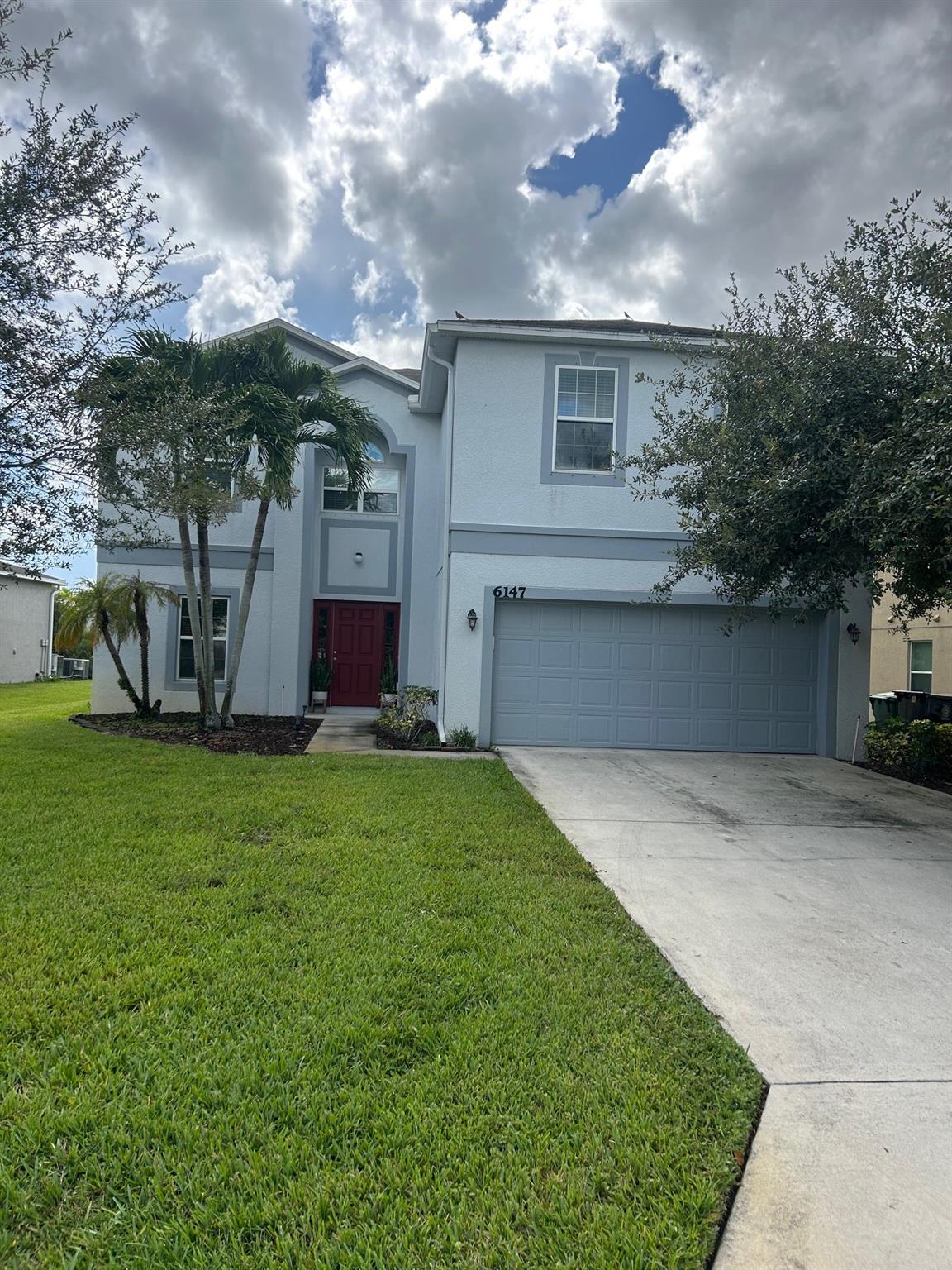 THIS IS THE ONE! Beautiful, well-kept, single-family home in WINTERHAVEN with 2,878 sq. ft. under air. 4 spacious bedrooms, 2 full bathrooms & large Loft upstairs. Ground floor has Foyer, formal Dining Room, Guest Bathroom, large Bonus Room (suitable for playroom/office/or den), Laundry Room, Huge Living/Family Room, Dining area & well-equipped Kitchen with Stainless steel appliances, white cabinets, an Island & 2 generous pantries. Floors on ground level tiled, w/ carpet in formal dining area & family room. Stairs as well as upper level carpeted except bathrooms. Water views from all 3 secondary bedrooms upstairs & from Kitchen, Dining area & Family room. Very large, screened back patio with BBQ Grill & tranquil views of the lake. Refrigerator in Garage stays. Very reasonable Rent.