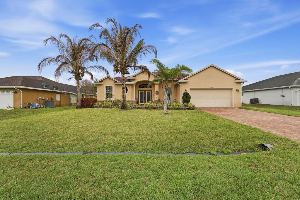 Photo of 6988 NW Hartney Way, Port Saint Lucie, FL 34983 (MLS # B26008348)