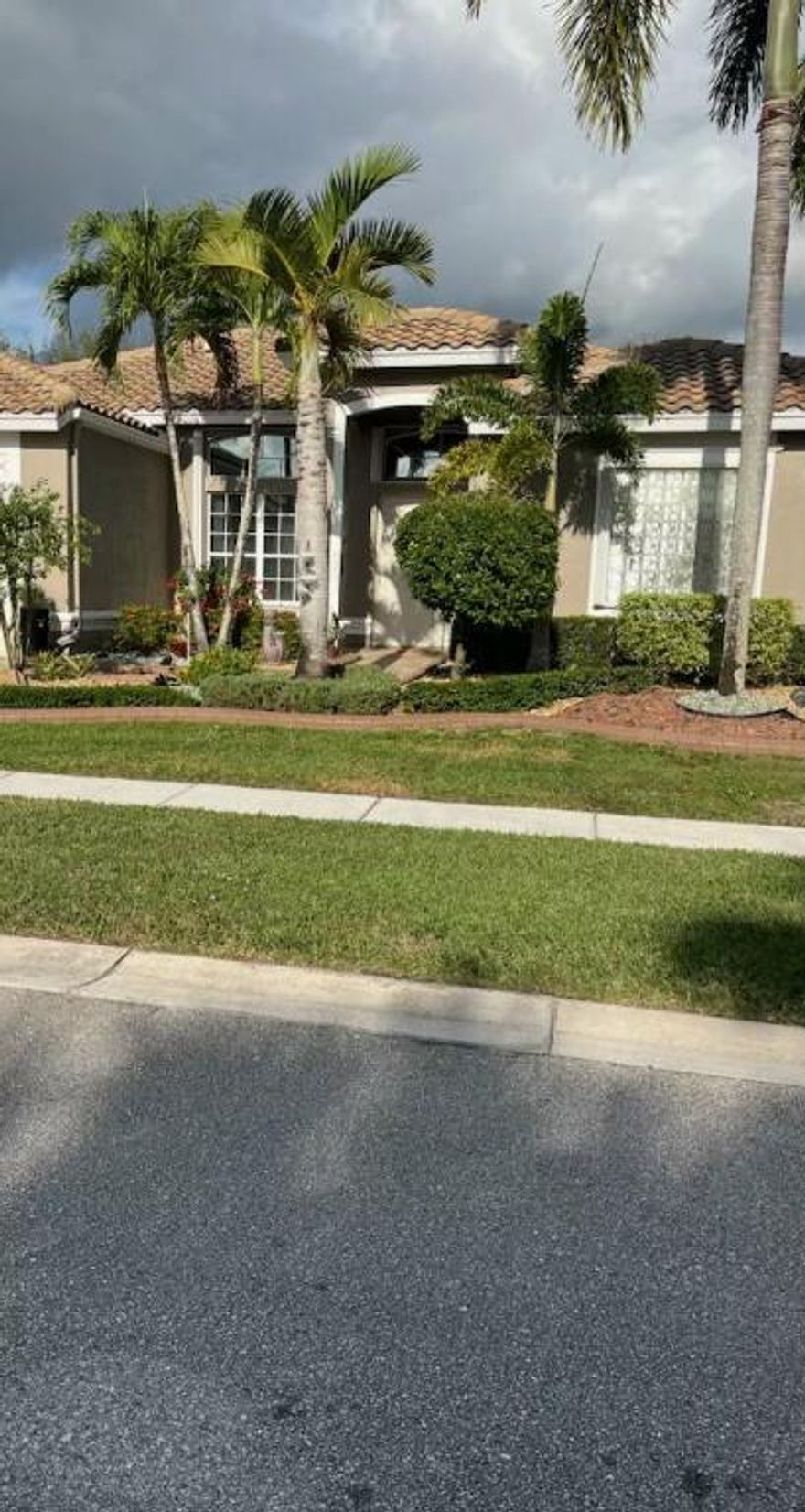 Large model estate home in Bellaggio. The Seller enclosed the lanai for an expanded living area. Enter through the elegant double doors into the foyer, leading to an open, expansive floor plan with easy-care laminate wood floors. Kitchen features 42' wood cabinets w/granite countertops. The main bath has a sep shower & roman tub. The breakfast area opens to a large family room w/sliders from FR & LR opening to the enclosed lanai which has a beautiful view of the lake and preserve. This home sits on a lushly landscaped private lot with no rear neighbors. The home has accordion shutters & central vac. Welcome to the Bellaggio lifestyle which offers a grand clubhouse w/cafe, entertainment, heated salt water resort-style indoor & outdoor pools, fitness center, pickleball, tennis and more.