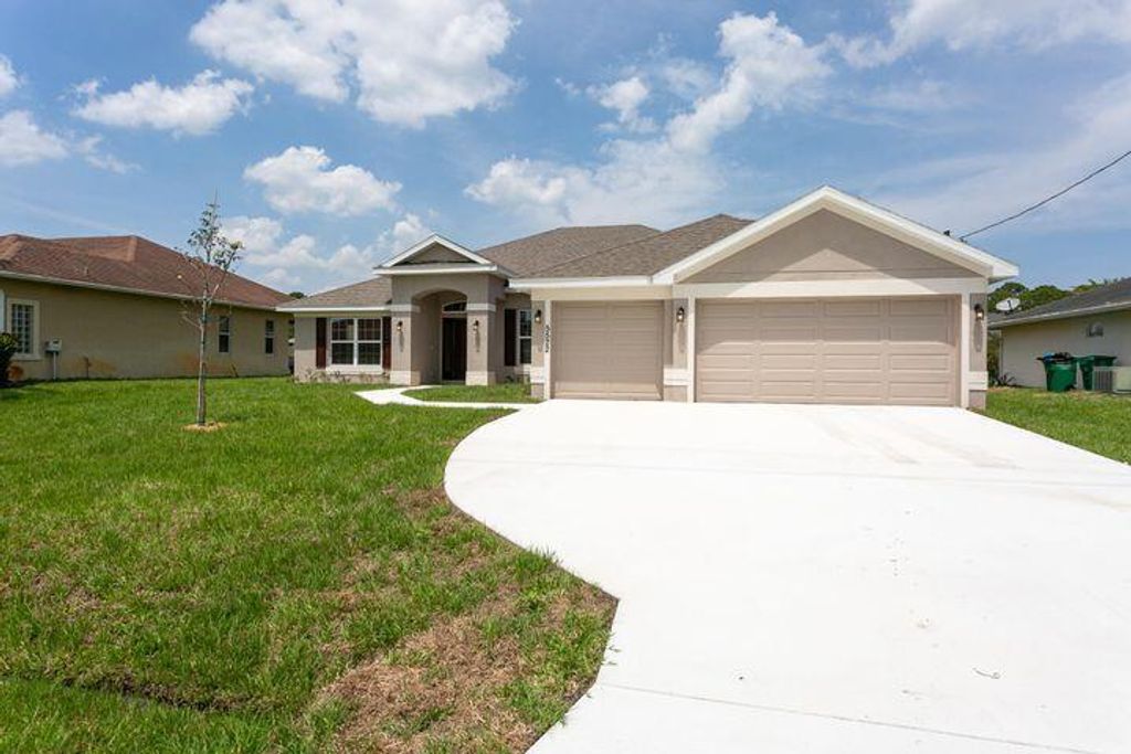 Photo of 5431 NW Edgewater Avenue, Port Saint Lucie, FL 34983 (MLS # R10741711)