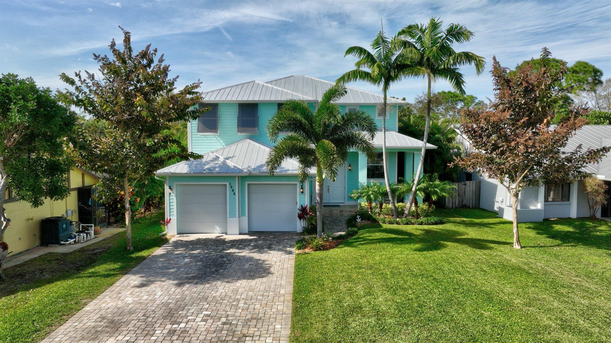 Don't miss out on this ocean access, pool home in the heart of Palm City built in 2017. Neighborhood canals were dredged last year...This Energy Efficient home includes 2 stories of concrete block, on steam wall, spray foam insulation, metal roof with peel & stick underlayment, impact windows & more! The open concept with 10' plus ceilings, 8' doors, & travertine flooring make the home inviting. The kitchen features a large island, 2 separate sinks, 36'' cooktop, 42'' cabinets w/ soft close, walk in pantry & stainless appliances. The interior foyer is open to the 2nd floor with a stunning wrap around railing. Upstairs includes 4 bedrooms, 2 bathrooms, laundry & loft area with a relaxing balcony off the back of master!