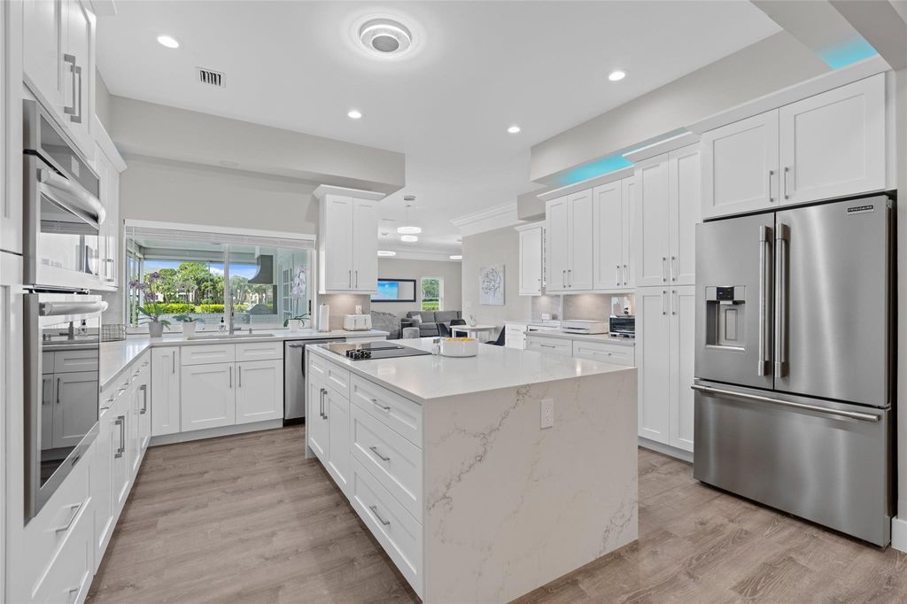 Photo of 9010 Gardens Glen Circle, Palm Beach Gardens, FL 33418 (MLS # B26000449)