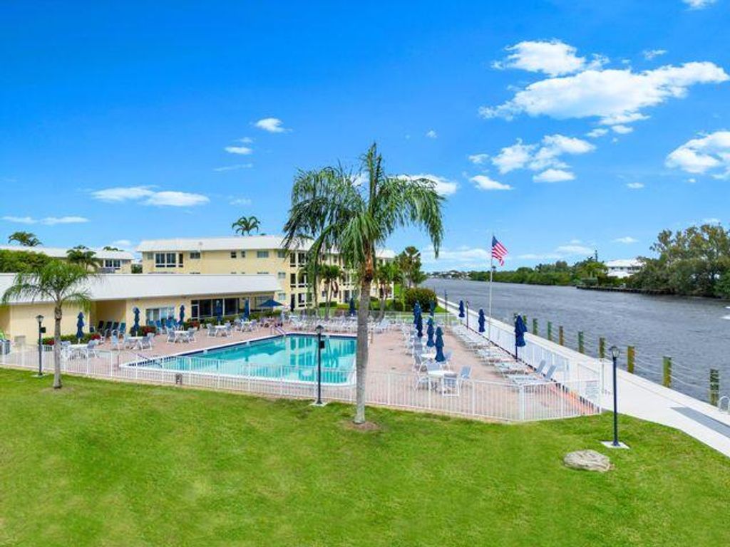 Photo of 14 Colonial Club Dr #203, Boynton Beach, FL 33435 (MLS # R11062075)