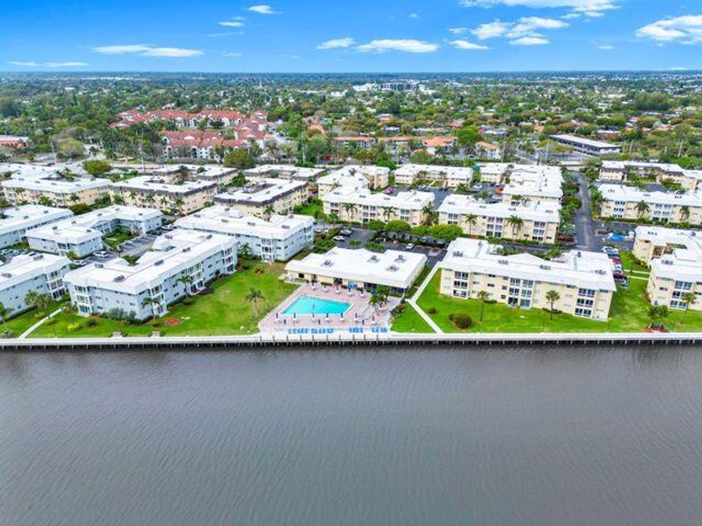 Photo of 14 Colonial Club Dr #203, Boynton Beach, FL 33435 (MLS # R11062075)
