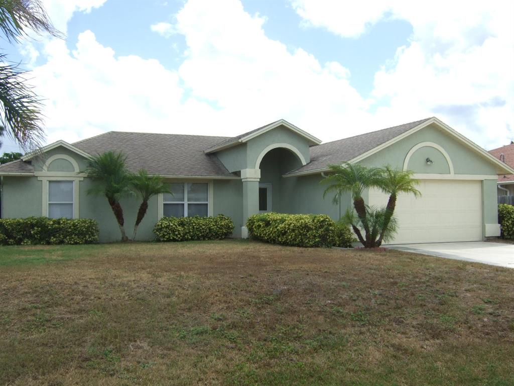 3 BR 2 BA rental in western PSL. Spacious backyard, screened patio, tile throughout, open concept. Ready to move in.