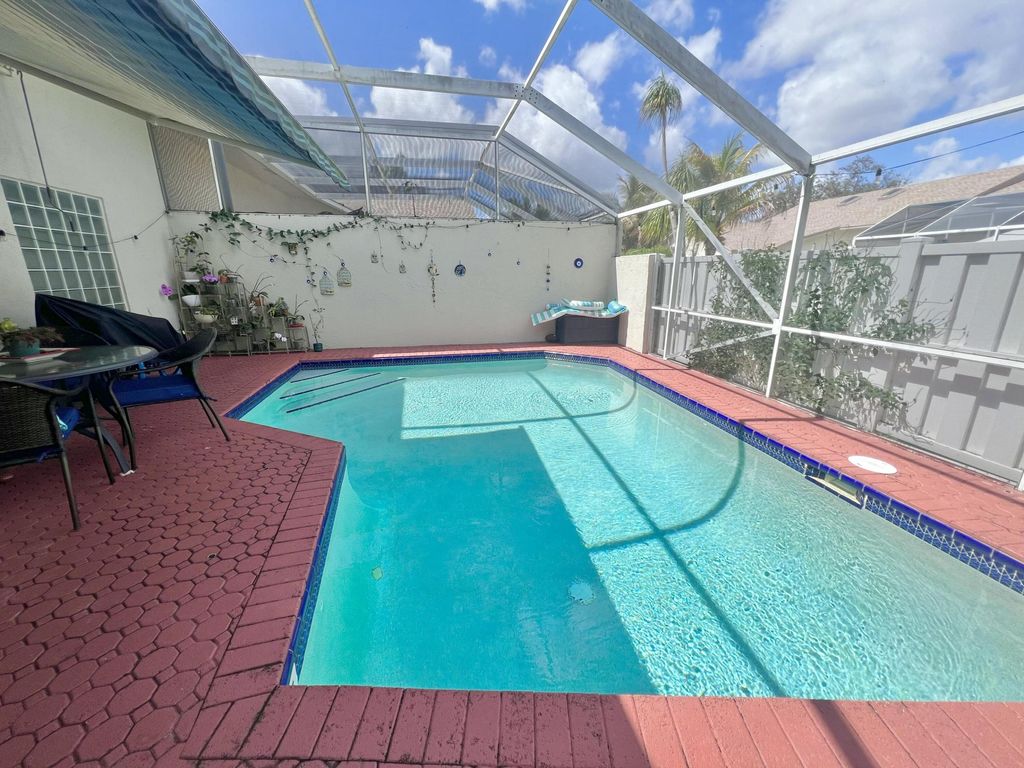 Photo of 9442 Boca Gardens Parkway #B, Boca Raton, FL 33496 (MLS # B26010949)