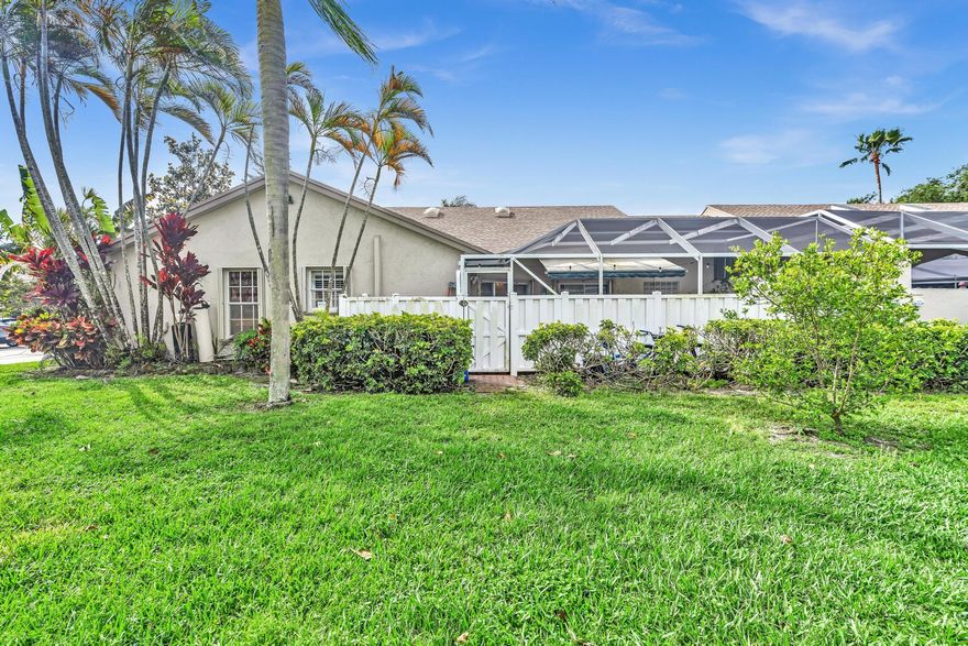 Welcome home! This beautifully updated one-level residence features three spacious bedrooms, modernized bathrooms. Filled with abundant natural light, the open floor plan. Enjoy your own private screened-in backyard oasis complete with a pool, perfect for relaxing or entertaining. The home has been fully upgraded, including a newer 2024 roof and gutters, newer A/C unit and duct system 2019, hurricane shutters, a whole-home water filtration system. Enjoy a custom-designed kitchen, featuring granite countertops, custom cabinetry, a large pantry, SS appliances. The elegant living area showcases stunning imported marble floors, natural light, skylights. Excellent location Boca Gardens, close to shopping, fine dining, beach, and Top Rated Schools. Call today for more info and private showings! Boca Gardens offers a resort-style lifestyle with three heated pools, a clubhouse, fitness center, and tennis, pickleball, basketball, and racquetball courts. Residents enjoy scenic lakes, walking paths, and a children's playground, all within a beautifully maintained, pet-friendly community conveniently located near top shopping, dining, and schools.