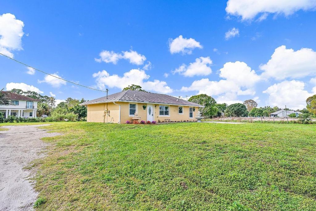 Photo of 18726 Orange Grove Boulevard, The Acreage, FL 33470 (MLS # R10953125)