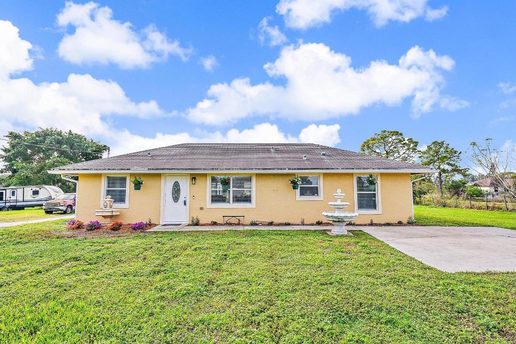 Photo of 18726 Orange Grove Boulevard, The Acreage, FL 33470 (MLS # R10953125)