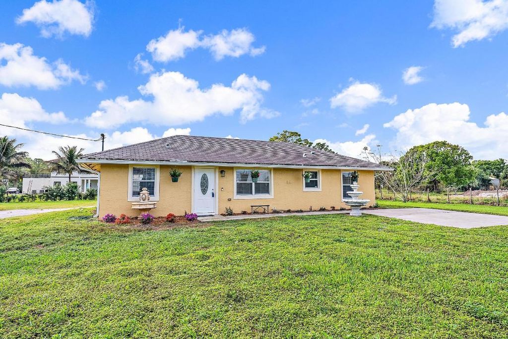 Photo of 18726 Orange Grove Boulevard, The Acreage, FL 33470 (MLS # R10953125)