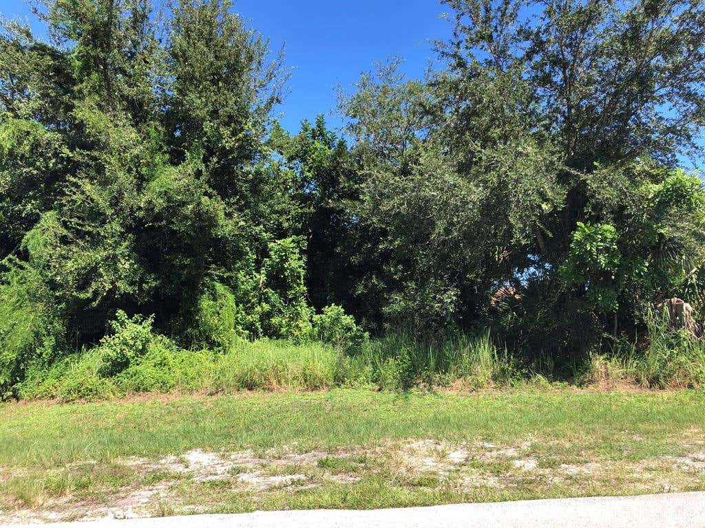 Photo of 1999 SW Monterrey Lane, Port Saint Lucie, FL 34953 (MLS # R10751571)