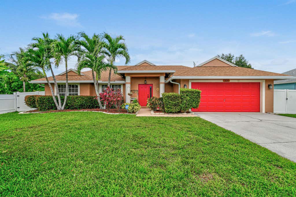Photo of 1891 SW Inlander Avenue, Port Saint Lucie, FL 34953 (MLS # R11103348)