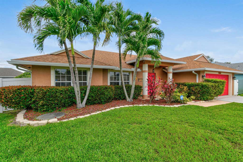 Photo of 1891 SW Inlander Avenue, Port Saint Lucie, FL 34953 (MLS # R11103348)