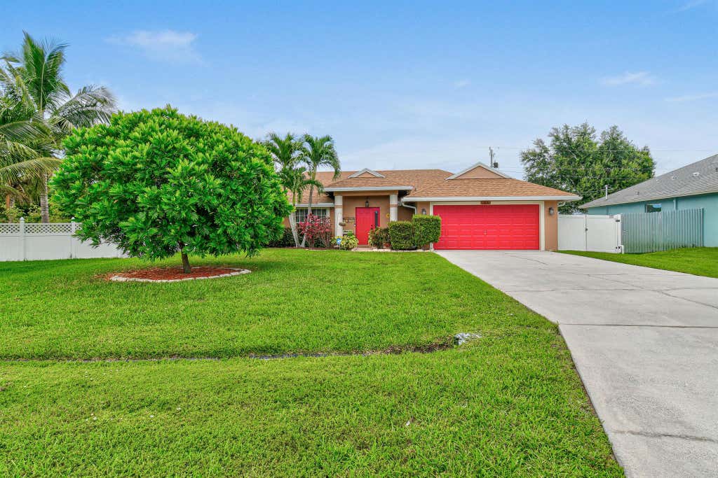 Photo of 1891 SW Inlander Avenue, Port Saint Lucie, FL 34953 (MLS # R11103348)