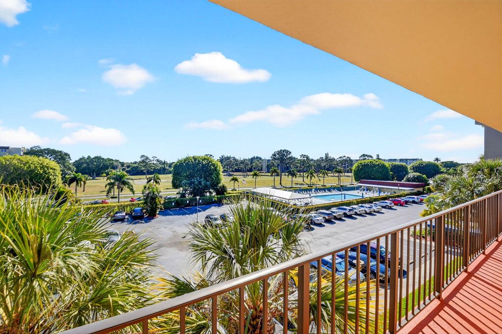 Photo of 3661 Via Poinciana #410, Lake Worth, FL 33467 (MLS # R11168473)