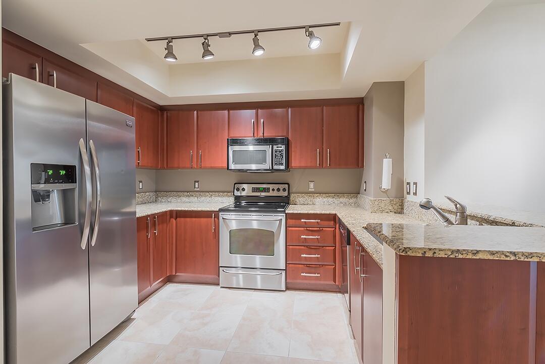 The Metropolitan is a classy mid-rise in the hub of downtown West Palm Beach. Resort style rooftop pool, fitness center, clubhouse, lobby and more. This unit has a fantastic courtyard view from the living room and a city view from the bedrooms. Kitchen is fully equipped with granite countertops, stainless steel appliances, and nice dark cabinetry. Building includes water, sewer, trash, basic cable & internet. Best price for the value!