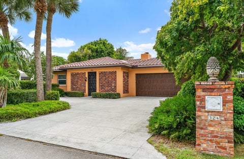 Photo of 324 Sandal Lane, Palm Beach Shores, FL 33404 (MLS # B26084399)