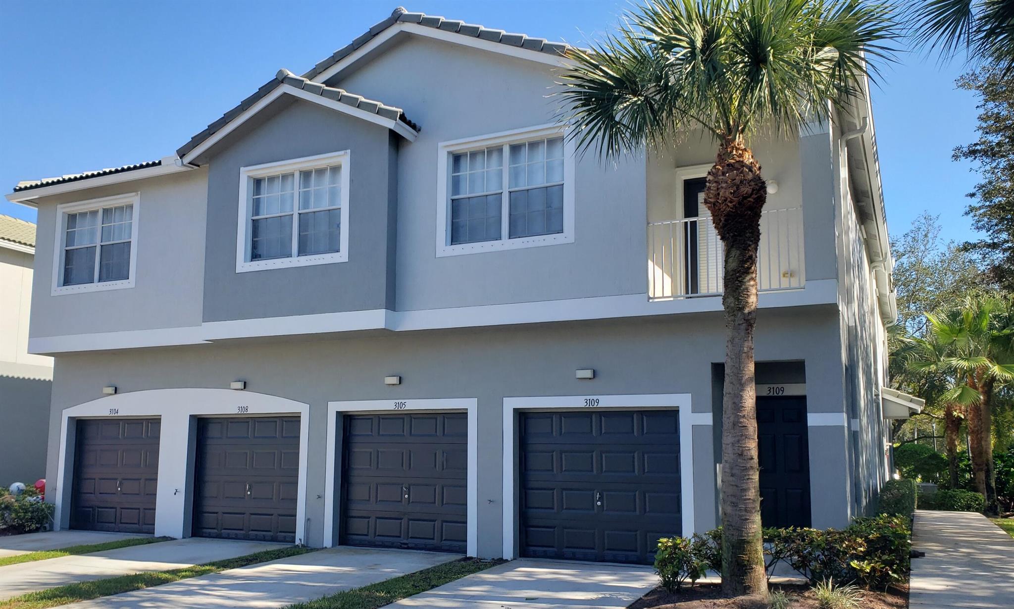 Move-in ready, spacious 2bed/2bath corner unit. Attached garage with private driveway. Cozy gated community. Excellent location. New paint. New flooring. New window coverings and fixtures. Updated kitchen and bathrooms with shaker cabinets and granite countertops. Like-new appliances. Long walk-in closet. Laundry inside unit. Lots of natural light and storage. Balcony. Water utilities, alarm monitoring, roof and exterior building maintenance are included. No waiting period to rent. All ages welcome. Pet-friendly community. Lots of guest parking. Community pool. Just minutes from the popular Okeeheelee Park, where you can explore the nature center, bike, play sports, enjoy water activities, try the fitness trails, watch BMX racing, or have a relaxing picnic. Conveniently close to beaches