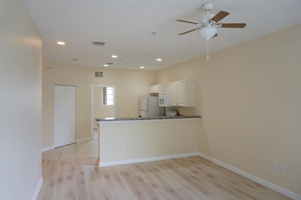 Photo of 1931 Marsh Harbor Drive, Riviera Beach, FL 33404 (MLS # R11129033)