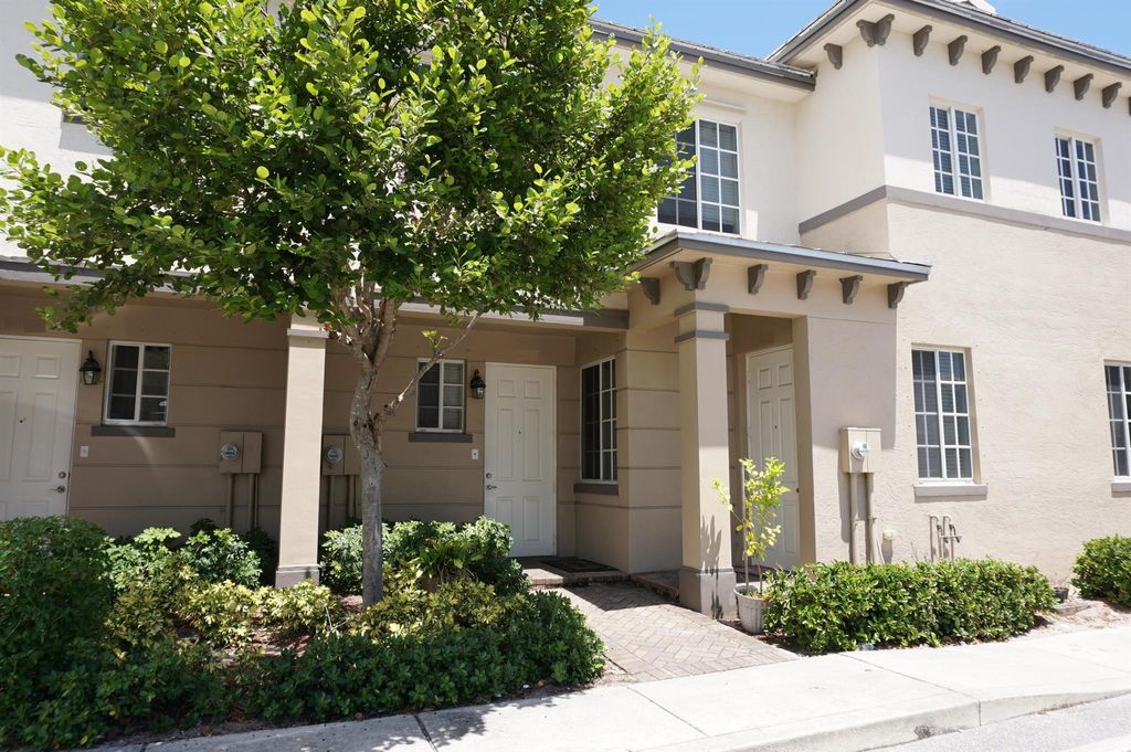Photo of 1931 Marsh Harbor Drive, Riviera Beach, FL 33404 (MLS # R11129033)
