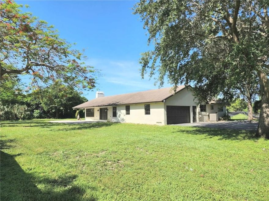 Escape from the hustle and bustle of city life to the Redlands, become one  with nature and enjoy peace, tranquility and privacy in this spacious, bright and airy 3/2.5 sitting in middle of huge lot. There is room for a pool and additional  expansion, the possibilities are endless. Home features high ceilings and a view of nature from every room. Enjoy farm to table top meals by cultivating your own produce  or purchasing from the farms close by. The perfect place for a  relaxed and laid back life style.