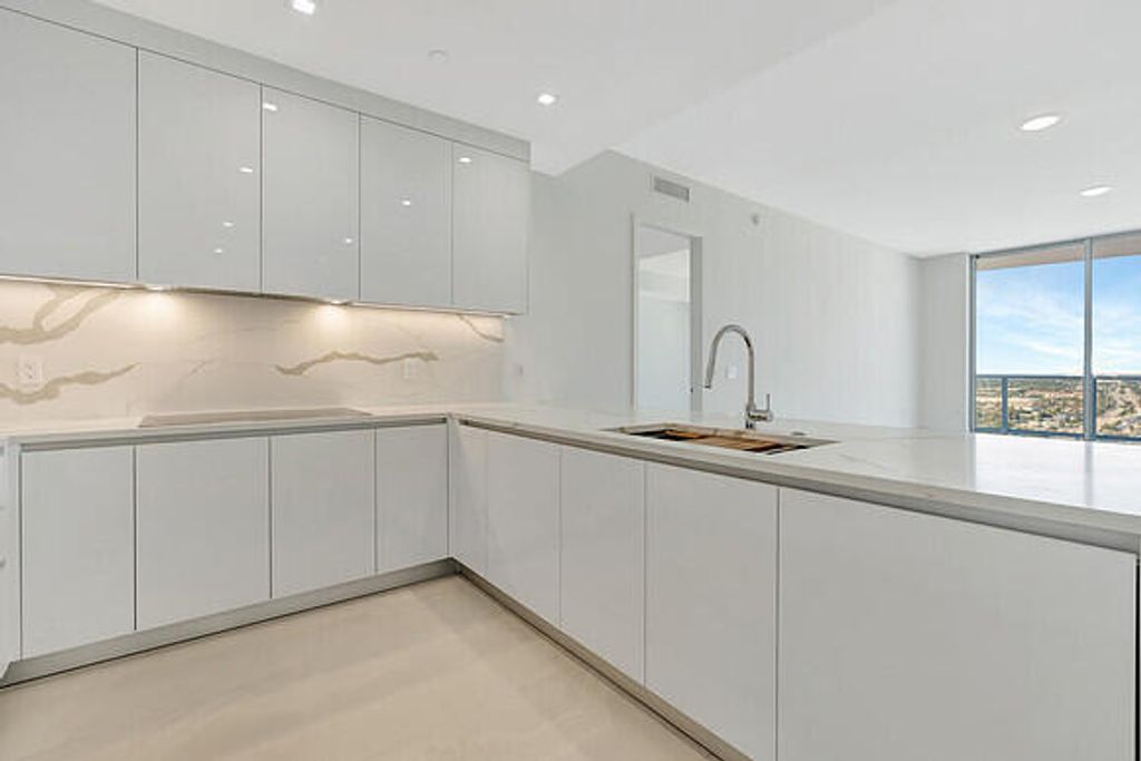 Photo of 220 Lake Shore Drive #2105, Lake Park, FL 33403 (MLS # B26003106)