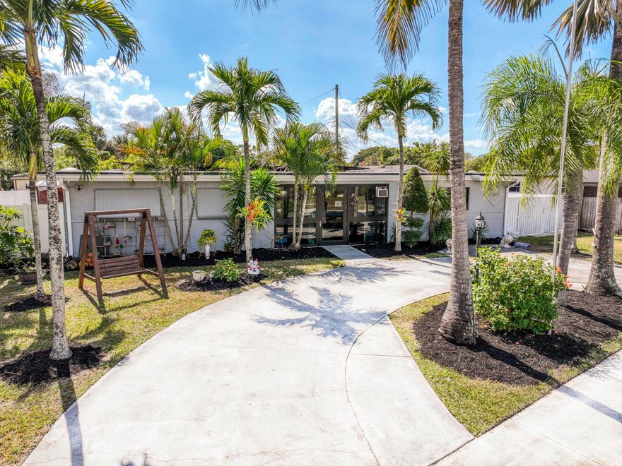 Beautifully updated 5BR/ 4BA home (fully detached studio) on a spacious corner lot. NO HOA. Main house features flat ceilings, crown molding, recessed lighting, white tile floors, and a spacious kitchen. Split floor plan offers great flow and functionality. Circular driveway fits 5+ cars. Detached studio includes full kitchen, bathroom, washer/dryer, and private entrance. Currently rented; tenant can vacate with 30-day notice. Ideal for rental income, in-laws, or home office. Property includes solar panels for lower electric bills. Fully paved backyard with heated POOL, JACUZZI, mini outdoor kitchen, storage shed, and fully fenced yard. Excellent opportunity for multi-generational living.