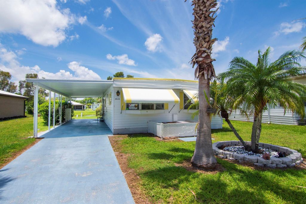 Photo of 7 S Granada Lane, Port St Lucie, FL 34952 (MLS # R10891388)