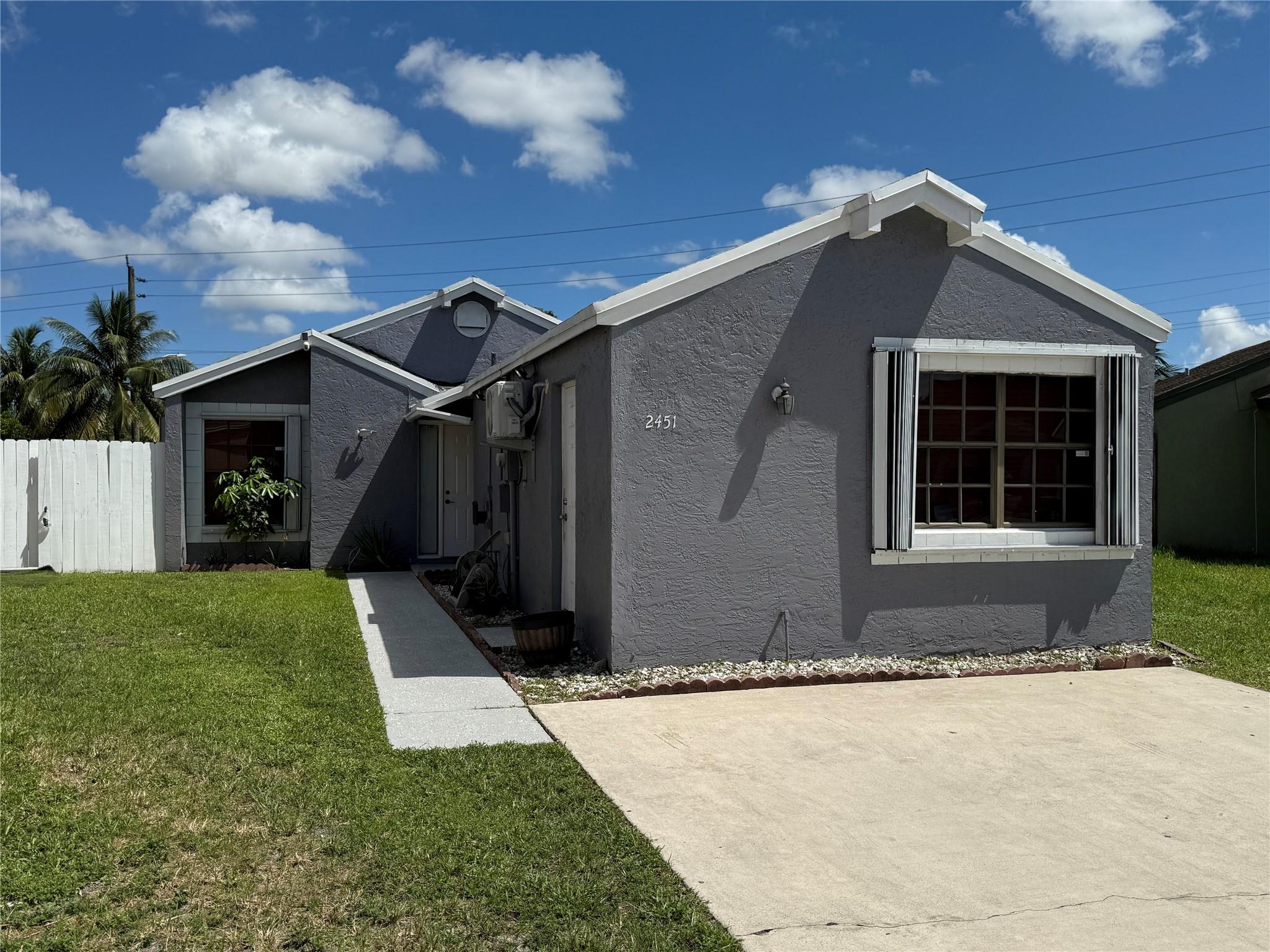 Welcome to this beautifully maintained single-family home in the heart of Miramar! This spacious residence offers **3 bedrooms, 2 bathrooms**, and a bright open-concept layout perfect for modern living. The updated kitchen features sleek cabinetry, granite countertops, and stainless steel appliances. Enjoy a cozy primary suite with an en-suite bath and ample closet space. Step outside to a private fenced backyard—ideal for entertaining, gardening, or relaxing under the Florida sun. Conveniently located near shopping, dining, top-rated schools, and major highways for an easy commute. No HOA. Easy move in.