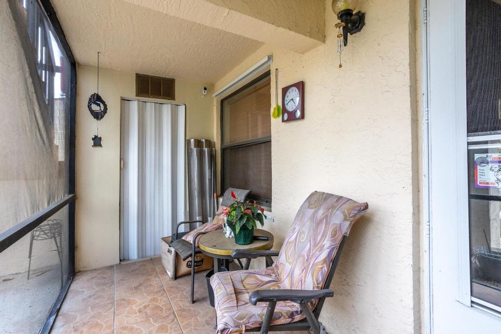 Photo of 7137 Golf Colony Court #103, Lake Worth, FL 33467 (MLS # R11157717)