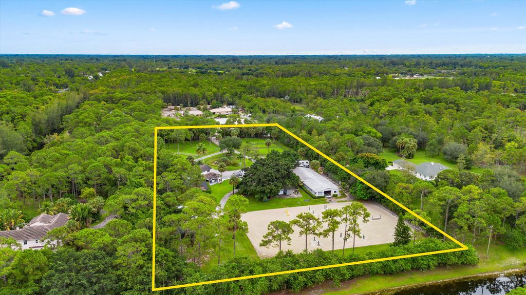 Photo of 2915 Doe Trail, The Acreage, FL 33470 (MLS # R11126056)