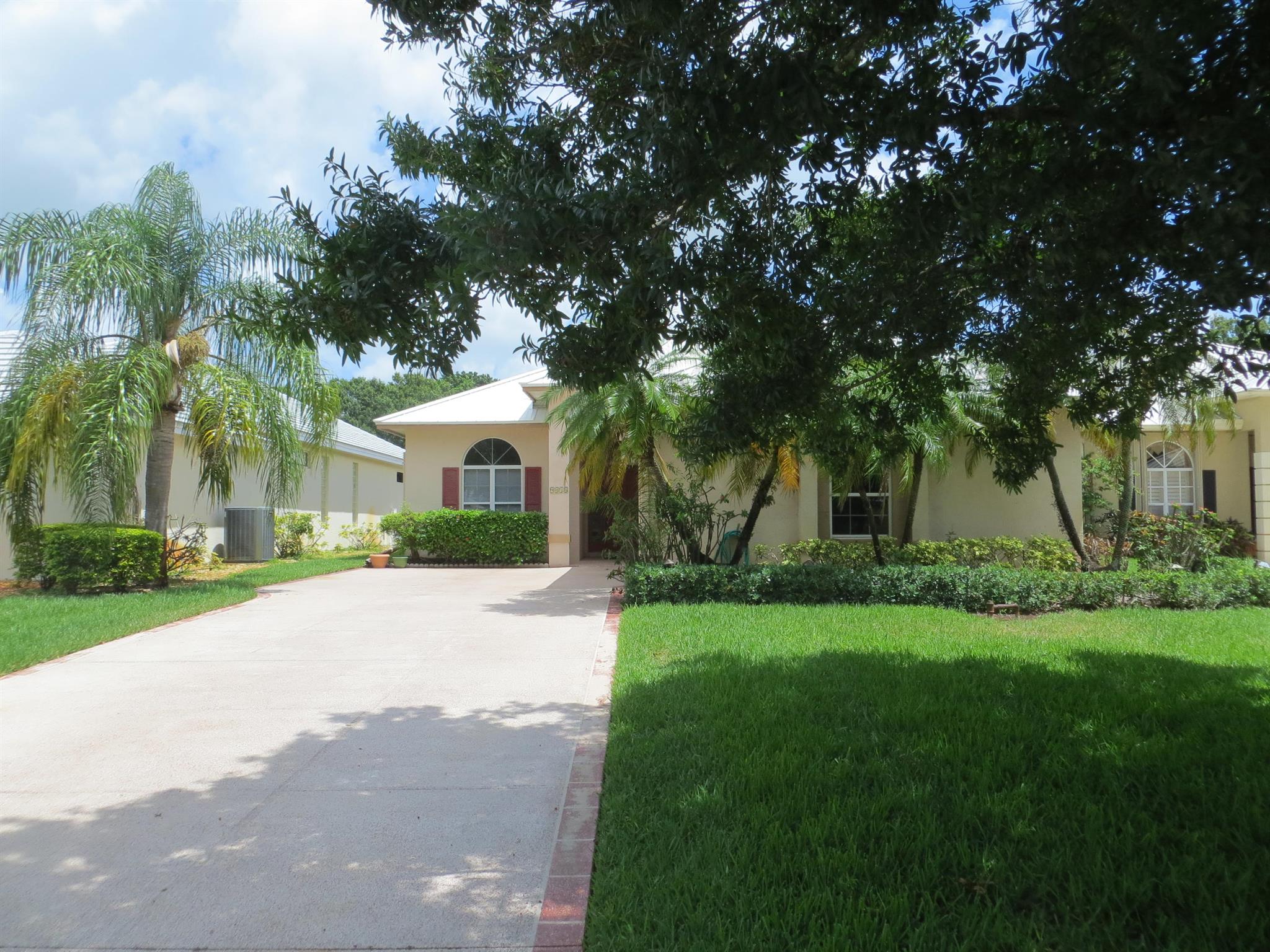 Gorgeous Meadowood Golf Community! On the golf course. Expanded floor plan with high ceilings, clerestory windows and incredible golf course views. Have you been dreaming about relocating to sunny Florida? This home feels super spacious with an open floor plan and tons of natural light. With a huge master bedroom with large ensuite bath, large closets in every bedroom and the most peaceful setting you could ever imagine, this could be the one. The kitchen opens to a lovely eat in area overlooking the golf course and even includes a pantry closet with loads of shelves for ample storage. Roof 2021, HVAC 2024. HOA provides excellent value with a manned security gate, cable, wifi and water included. The enormous, screened lanai provides plenty of space for grilling and outdoor enjoyment.