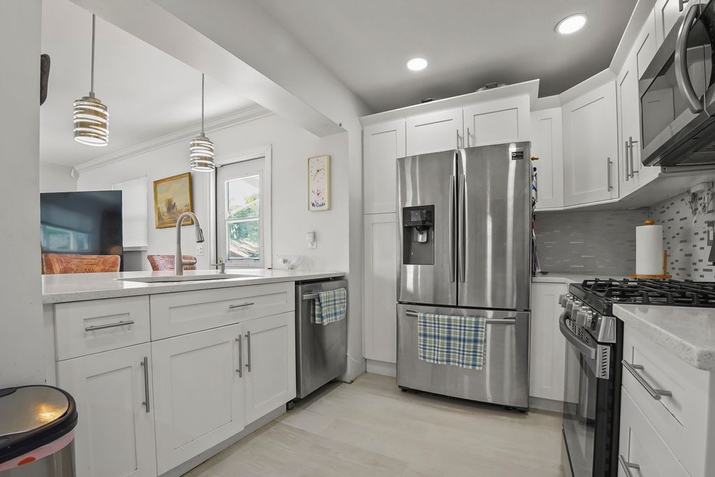 Photo of 1737 N 14th Avenue N, Lake Worth Beach, FL 33460 (MLS # B26016998)