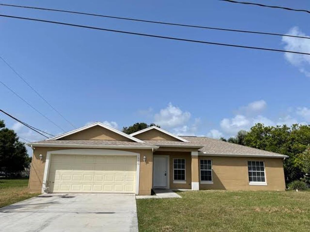 Photo of 1886 SE Balleto Street, Port Saint Lucie, FL 34952 (MLS # R10740929)
