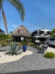 Located at Silver Palms RV Resort, a 90 acre gated community. Beautiful well maintained lot. Finished casita( 14x10) with 1/2 bath, washer/dryer, ac, kitchen counter top. Tastefully decorated. Can be bought with all furnishings. Relax under your 14x12 tiki and enjoy all that Silver Palms has to offer. Clubhouse, daily activities, billiard, card, library and fitness rooms. Fully deeded lot ownership ! Poolside cafe, serving breakfast, lunch, dinners. Pickleball, dog park and so much more awaits you whether seasonal or full time use this piece of paradise could be yours. Motivated seller.