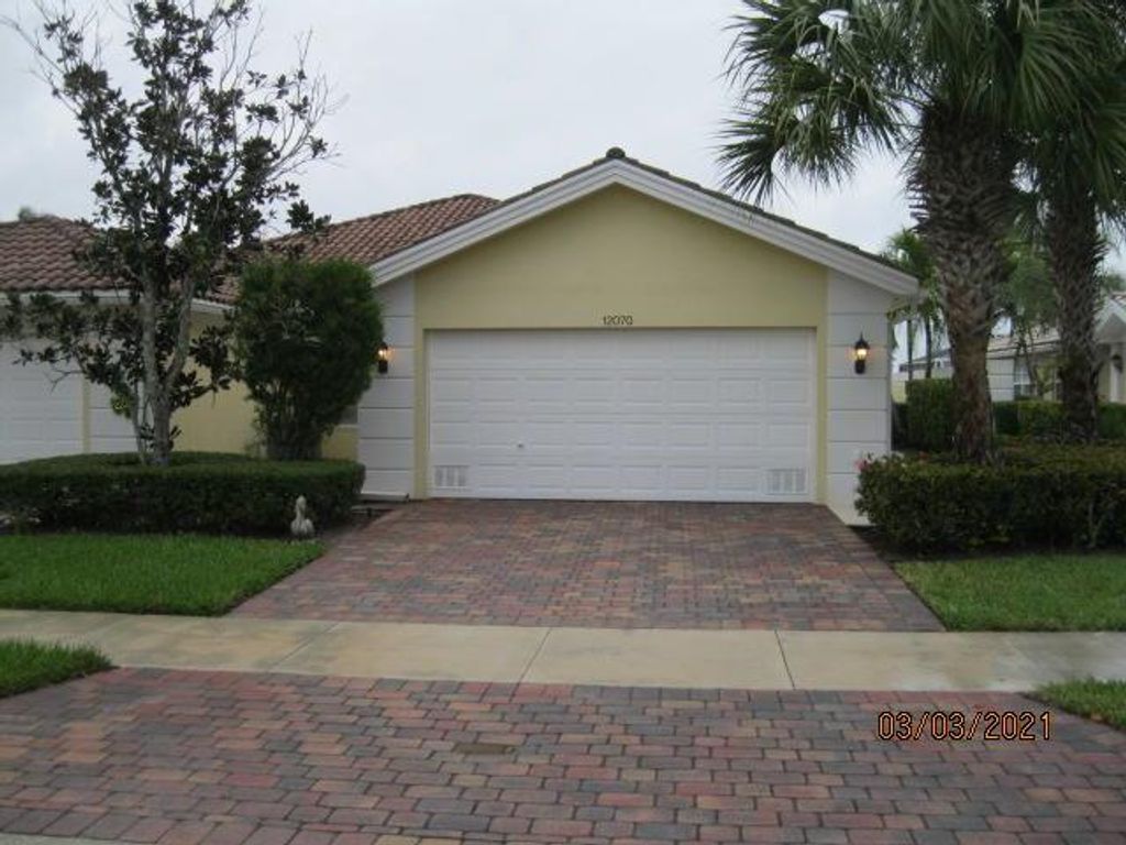 Photo of 12070 SW Elsinore Drive, Port Saint Lucie, FL 34987 (MLS # R10697975)