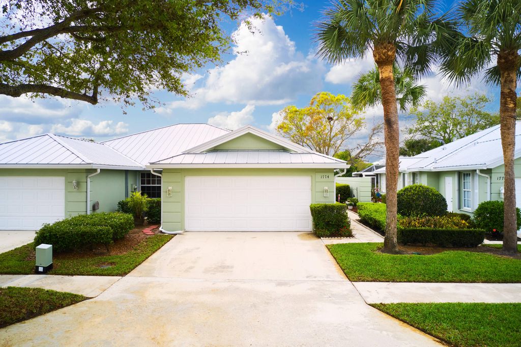 Photo of 1774 SW Waterfall Boulevard, Palm City, FL 34990 (MLS # B26005841)
