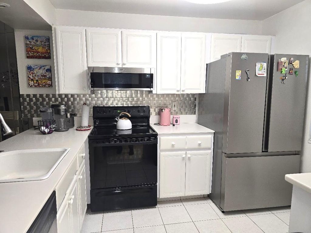 Photo of 4502 Martinique Way #G2, Coconut Creek, FL 33066 (MLS # B26020285)