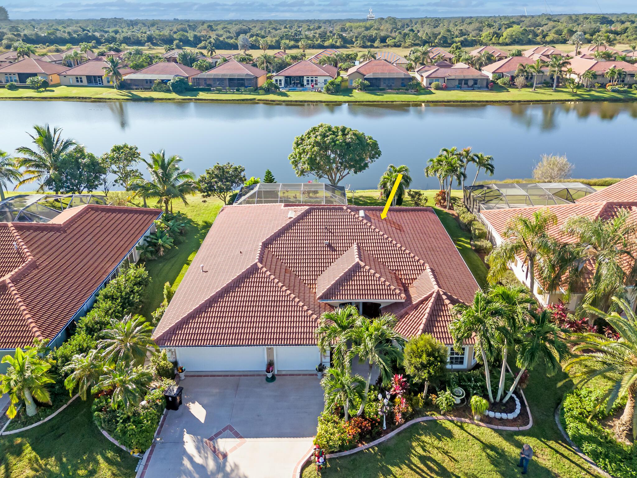 Stunning & exquisitely completely remodeled & well-appointed 3/2/2 lake view executive home with versatile use either office or den in desirable Heatherwood quaint community @ St Lucie West. Not just your average home, keen attention to detail, nicely manicured exterior with lush landscaping, nice open & flowing floor plan with upgraded tile flooring throughout., upgraded gourmet kitchen with large island with quartz countertop perfect for entertaining, a chef's delight. Formal dining, breakfast nook, formal living & cozy family room, extended porch overlooking the expansive view of the lake & majestic mature fruit trees. Oversized master suite with lake view. Great private community close to shopping, restaurants and I-95. Take a peek & fall in love. It's good to be to home! Just Lovel
