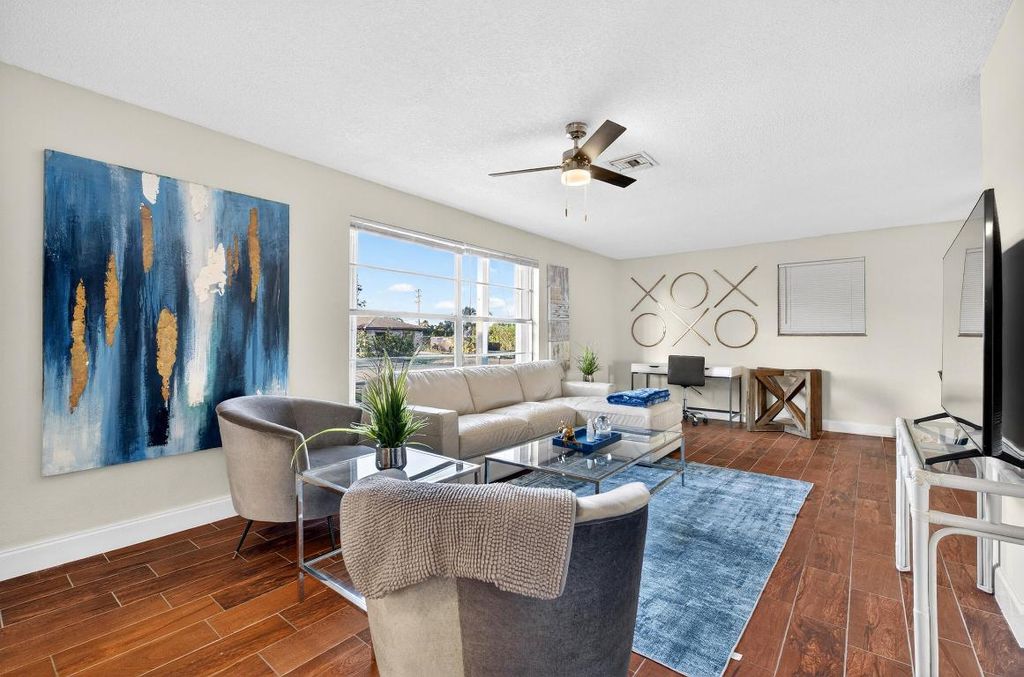 Photo of 584 SE Greenway Terrace, Port Saint Lucie, FL 34983 (MLS # R11147842)