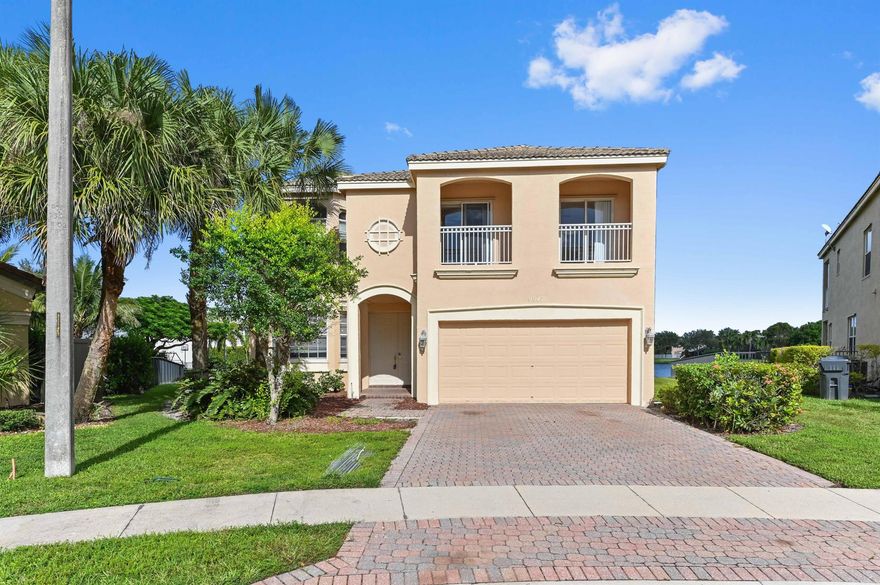 This beautiful waterfront home features 5 bedrooms and 2.5 bathrooms. The home is move-in ready for those looking to rent and  both spacious and bright. The large kitchen features stainless steel appliances and an island, great for cooking and entertaining. The home features a backyard covered patio space as well as a balcony, perfect for taking in the serene lake views.