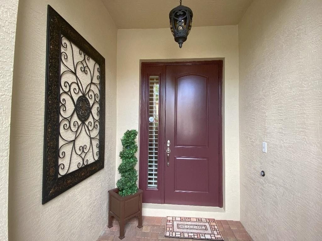Photo of 4115 Darlington Street, Palm Beach Gardens, FL 33418 (MLS # F10530334)