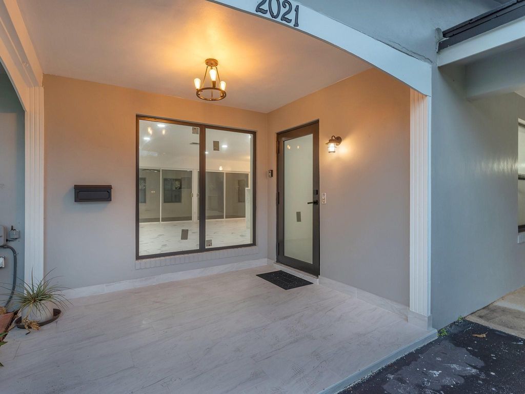 Photo of 2021 NE 59th Pl, Fort Lauderdale, FL 33308 (MLS # F10538635)