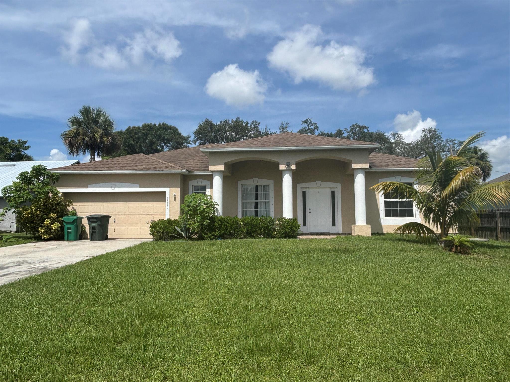 Spacious 4 bedroom + Office/Den, 2 bath home in the heart of Port St. Lucie. This single-story property offers over 2,000 sq ft of living space with a split floor plan, large family room, and open kitchen with breakfast area. The master suite features a walk-in closet, separate shower, and soaking tub. Additional highlights include volume ceilings, built-in shelves, and hurricane protection. Outside, enjoy a screened patio and a large private backyard with room for a pool. Conveniently located near highways, shopping, and restaurants, this home sits on a quiet street with easy access to all the Treasure Coast has to offer. Pets are allowed with restrictions. First, last, security due. Schedule a showing today!