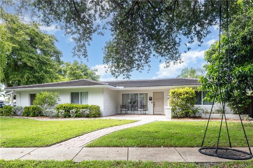 A high level of style and comfort graces every aspect of this beautiful pool home. An abundance of light and an overall feeling of freshness greets you upon entering. Here your friends and loved ones will gather in the sizeable remodeled kitchen that is the center of the home. Doors lead you to a large fenced in backyard where you will find a great size swimming pool and a large patio area. All the bedrooms are nice size and you will also find remodeled bathrooms. Home is hurricane prepared and roof is newer. We welcome you to home Monroe, nestled on a large corner lot in the wonderful neighborhood of Lawn Acres.
