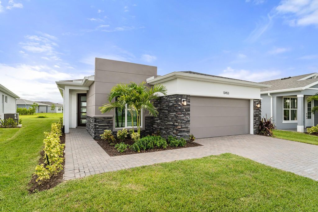 Photo of 13453 SW Bally Drive, Port Saint Lucie, FL 34987 (MLS # R11109560)