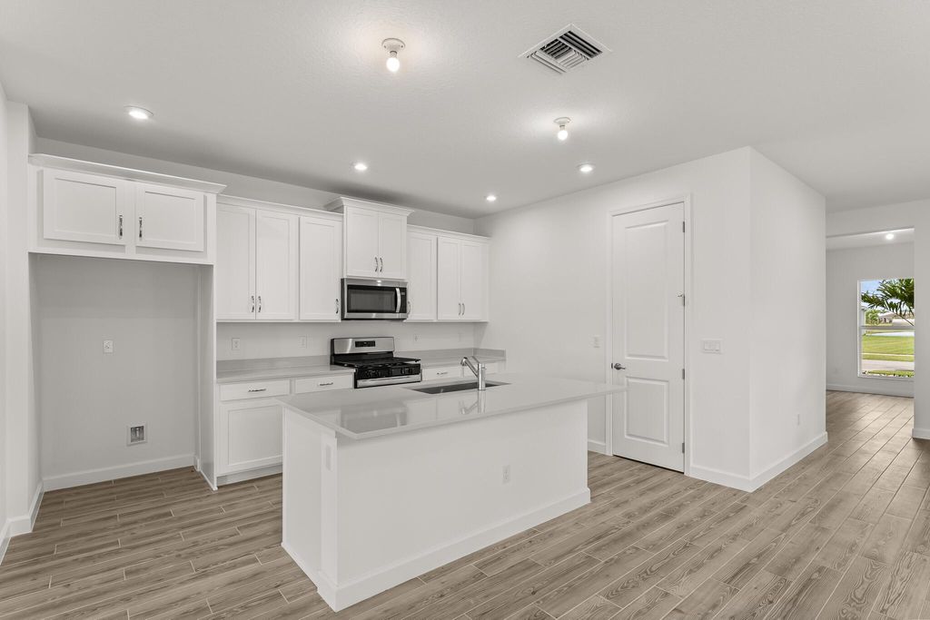 Photo of 13453 SW Bally Drive, Port Saint Lucie, FL 34987 (MLS # R11109560)