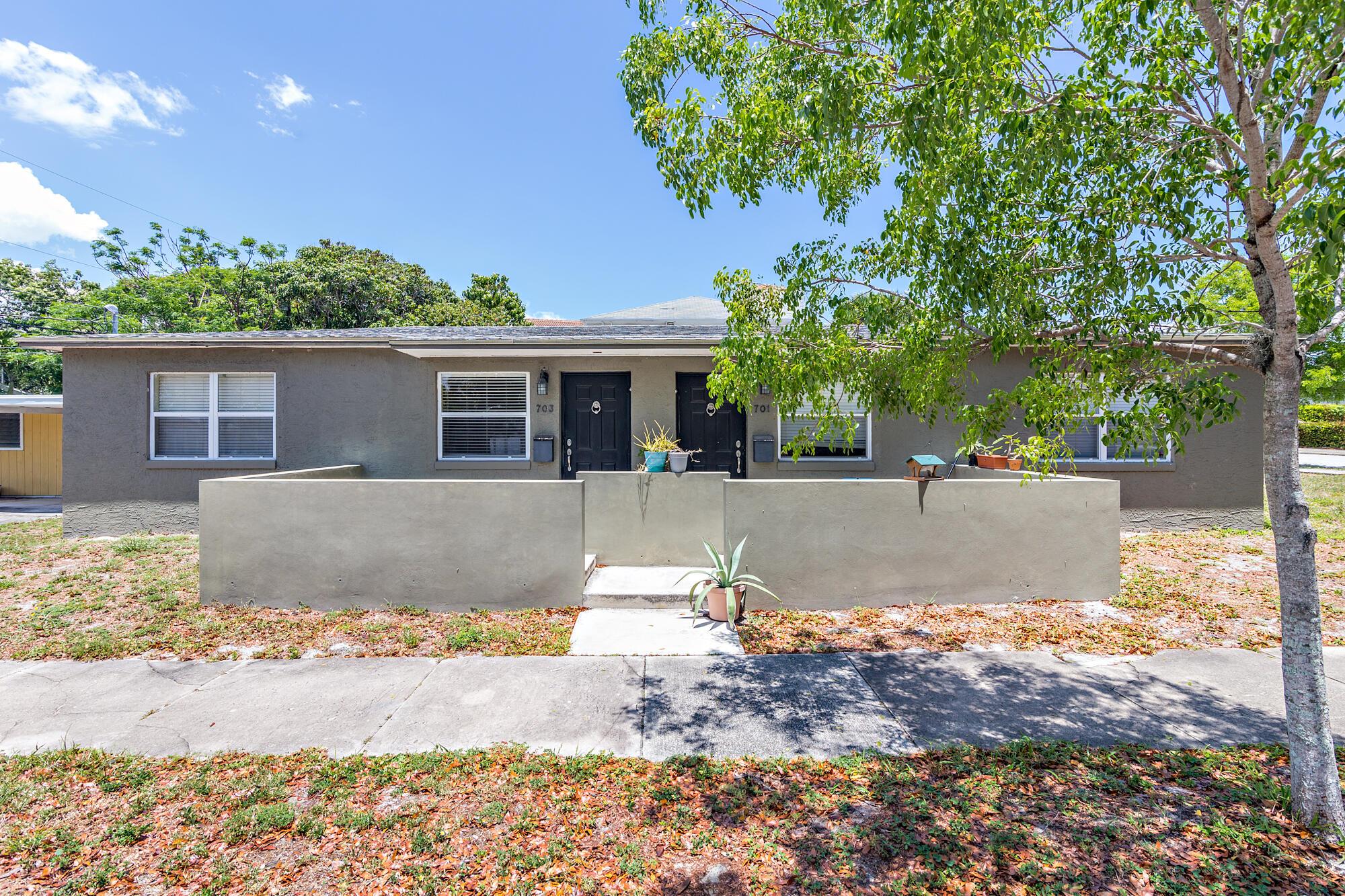 Duplex or potential to convert to single family residence. The east unit, 701, is a 2 bedroom, 2 bath and rents for $1750/month. The west unit is a 2 bedroom, 1 bath and rents for $1950/month. Both units offer updated kitchens and bathrooms and tankless water heaters. Room for a pool. Convenient to downtown West Palm Beach attractions, convenient to the airport and minutes to the beach.